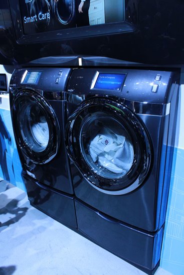 华为手机 能遥控的型号
:CES2012三星推出可用智能手机遥控滚筒洗衣机